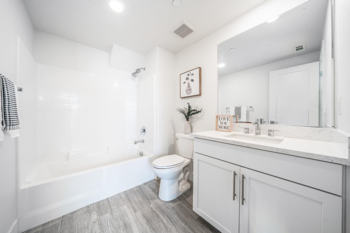 8553 Seawind Way Newark, CA 94560 - Photo 6 of 30 a bathroom with a sink toilet and shower
