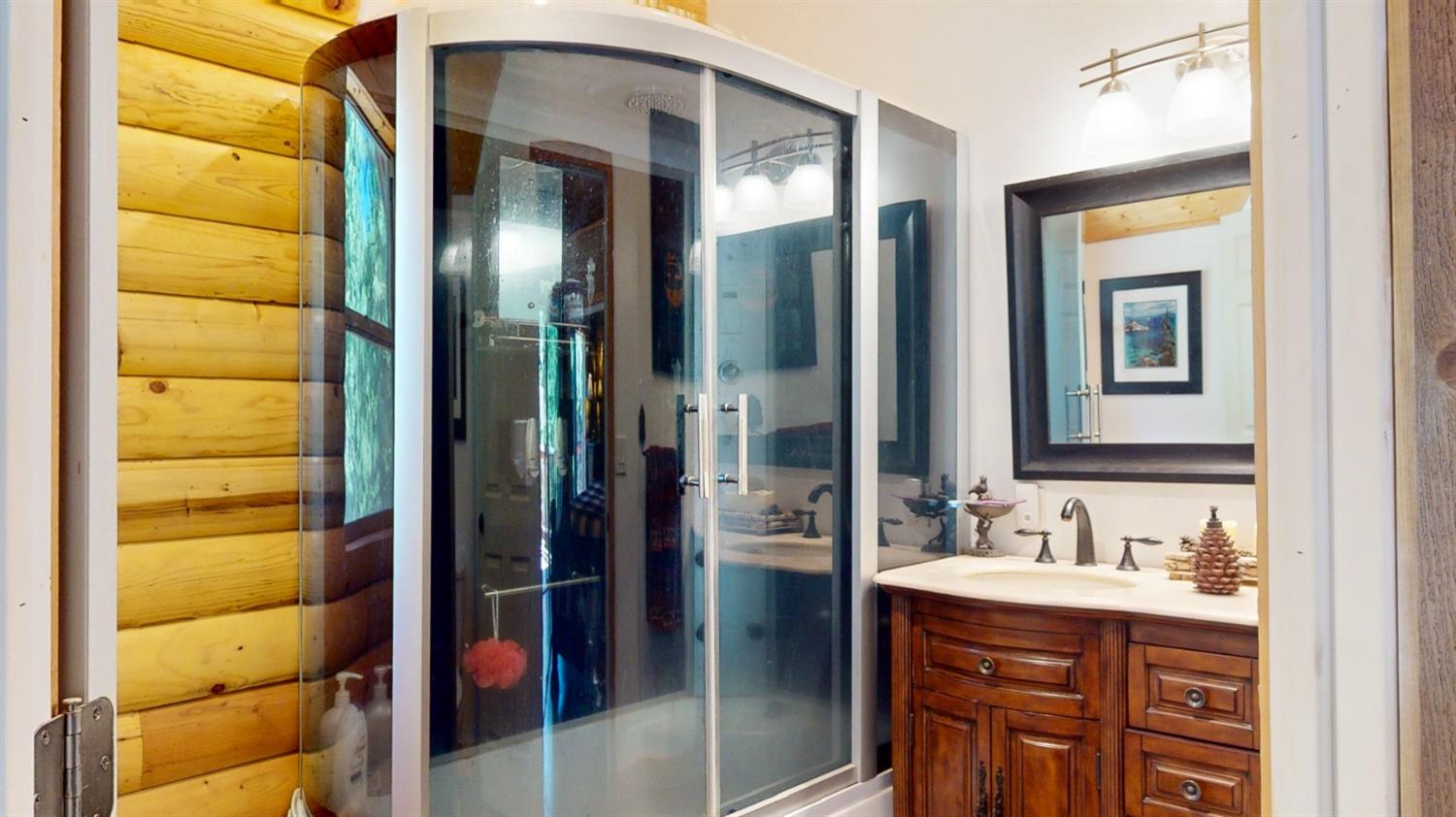 10671 Lowell Hill Road Nevada City, CA 95959 - Photo 13 of 35 a bathroom with a sink and a mirror