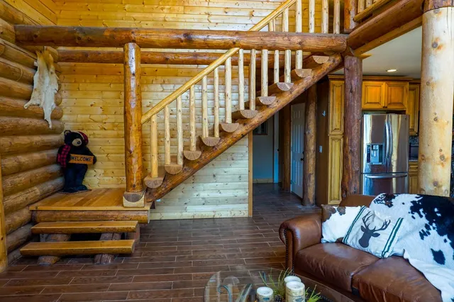 a view of a hallway with wooden shelves
