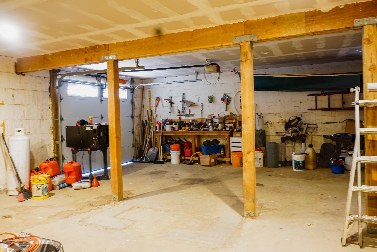 10671 Lowell Hill Road Nevada City, CA 95959 - Photo 20 of 35 a view of a garage with a bike and car