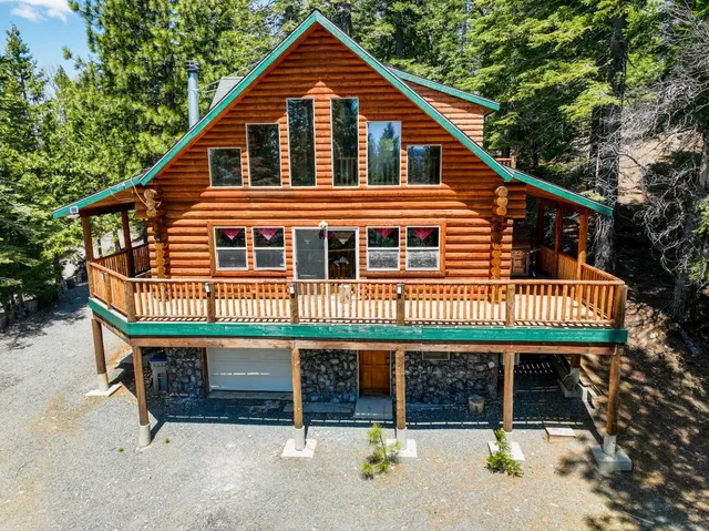 a front view of a house with a porch