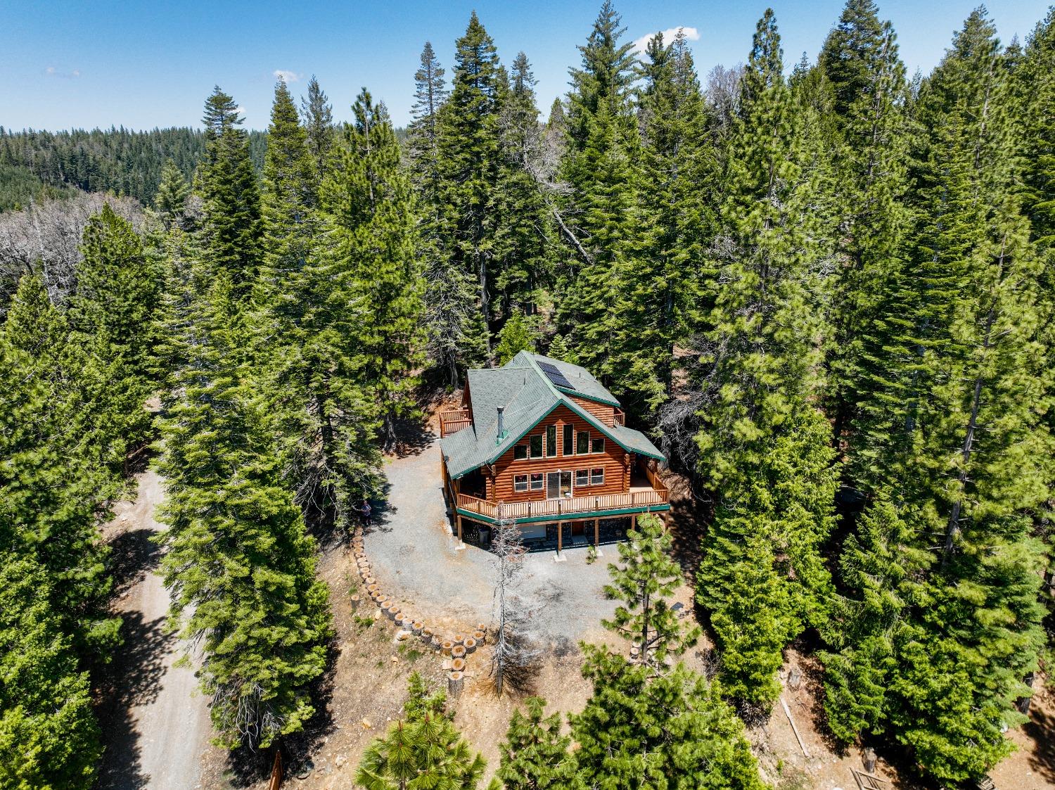 10671 Lowell Hill Road Nevada City, CA 95959 - Photo 29 of 35 a house with trees in front of it
