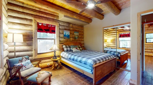 a bed room with a bed and a couch