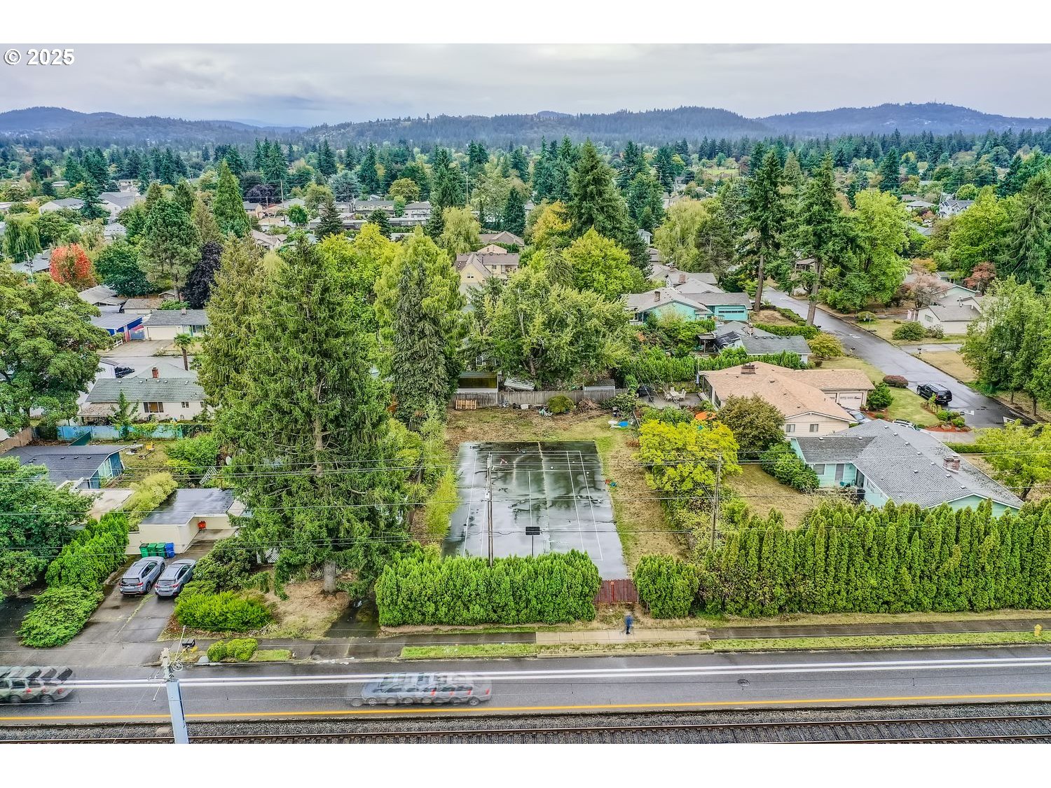15590 East Burnside Street Portland, OR 97233 - Photo 7 of 11 an aerial view of a house