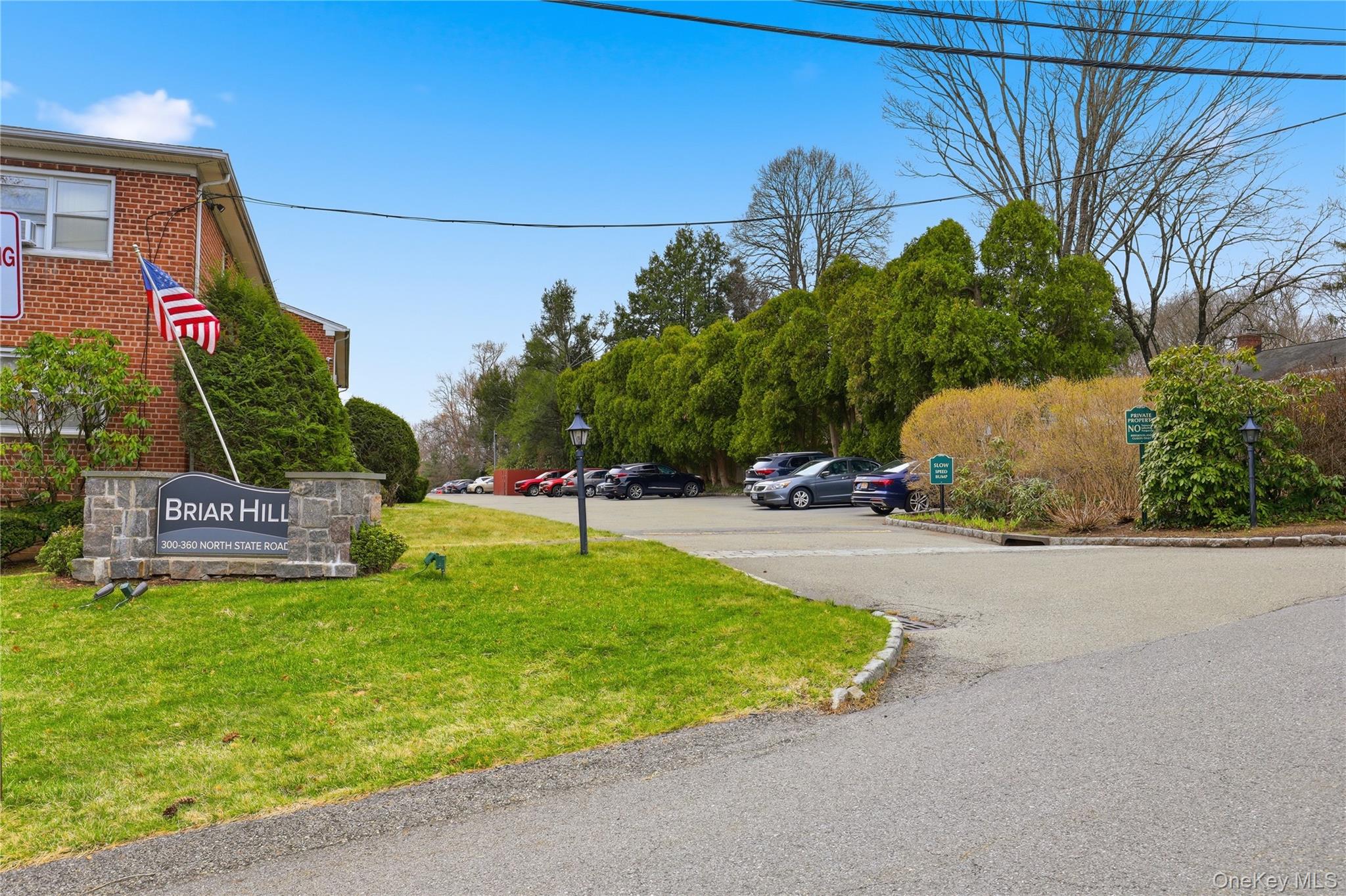 352 North State Road, Unit 1H Briarcliff Manor, NY 10510 - Photo 2 of 20 a view of a street with houses