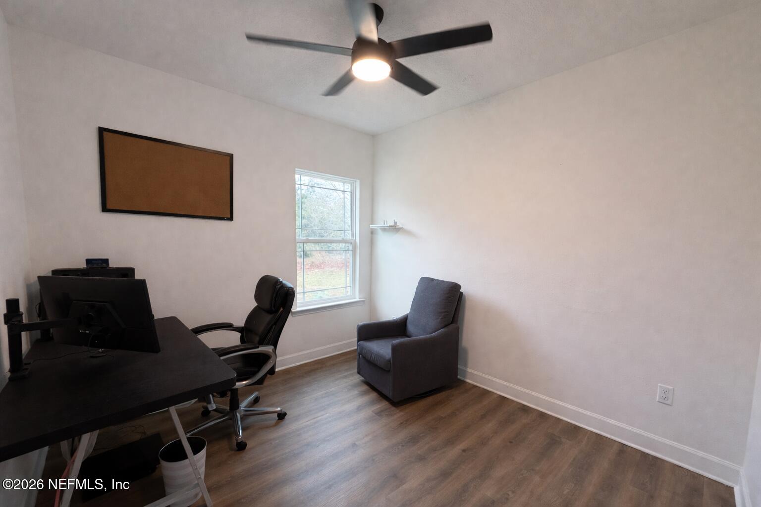 5012 Laurel Street Middleburg, FL 32068 - Photo 13 of 33 a workspace with furniture and a window