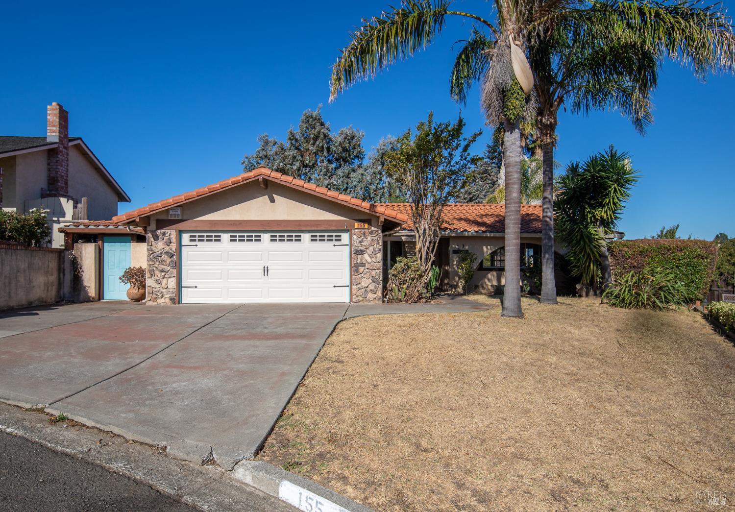 155 Pajaro Way Vallejo, CA 94591 - Photo 1 of 1 a view of a house with a yard and palm trees