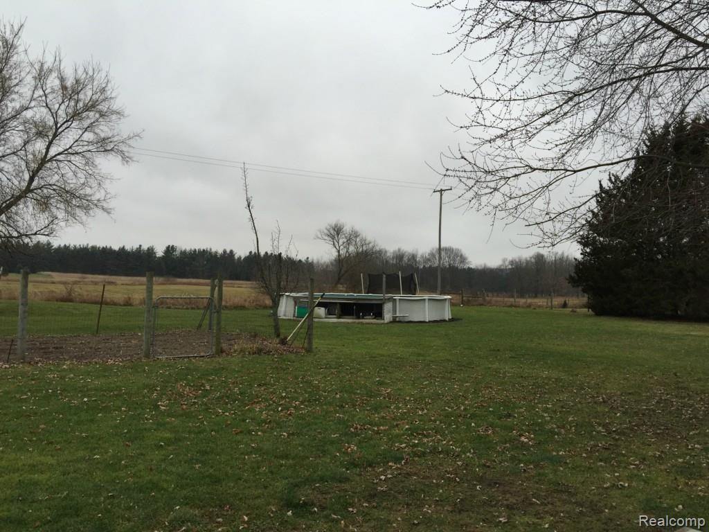 7305 Crofoot Road Fowlerville, MI 48836 - Photo 32 of 36 Above ground pool