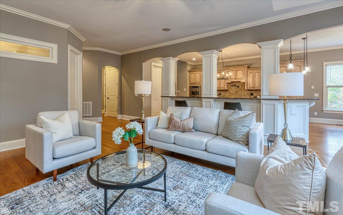 3220 Mossy Ridge Court Raleigh, NC 27613 - Photo 14 of 30 a living room with furniture and a large window