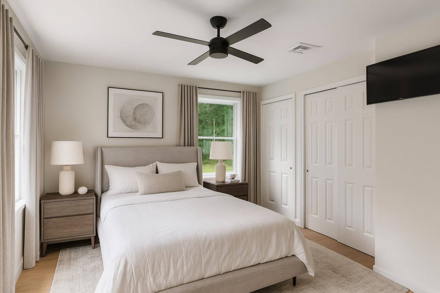75 Edwards Avenue East Hampton, NY 11937 - Photo 13 of 27 a bedroom with a bed and a chandelier