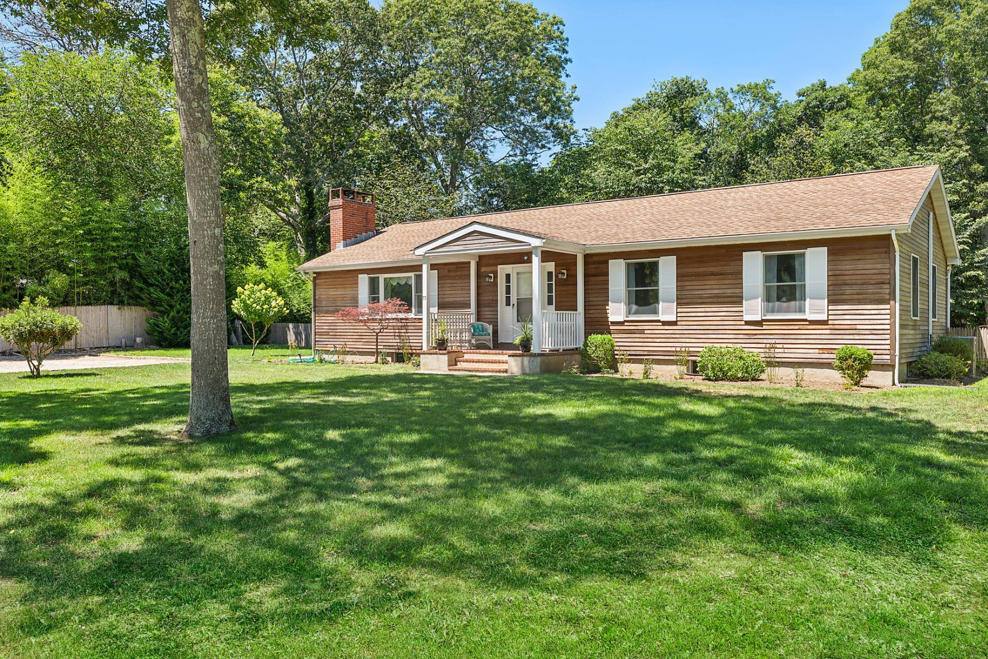 75 Edwards Avenue East Hampton, NY 11937 - Photo 4 of 27 a front view of house with yard and green space