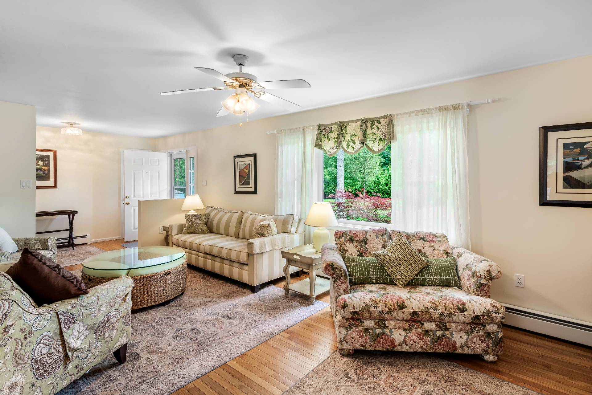 75 Edwards Avenue East Hampton, NY 11937 - Photo 6 of 27 a living room with furniture and a large window
