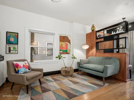 a living room with furniture and a couch