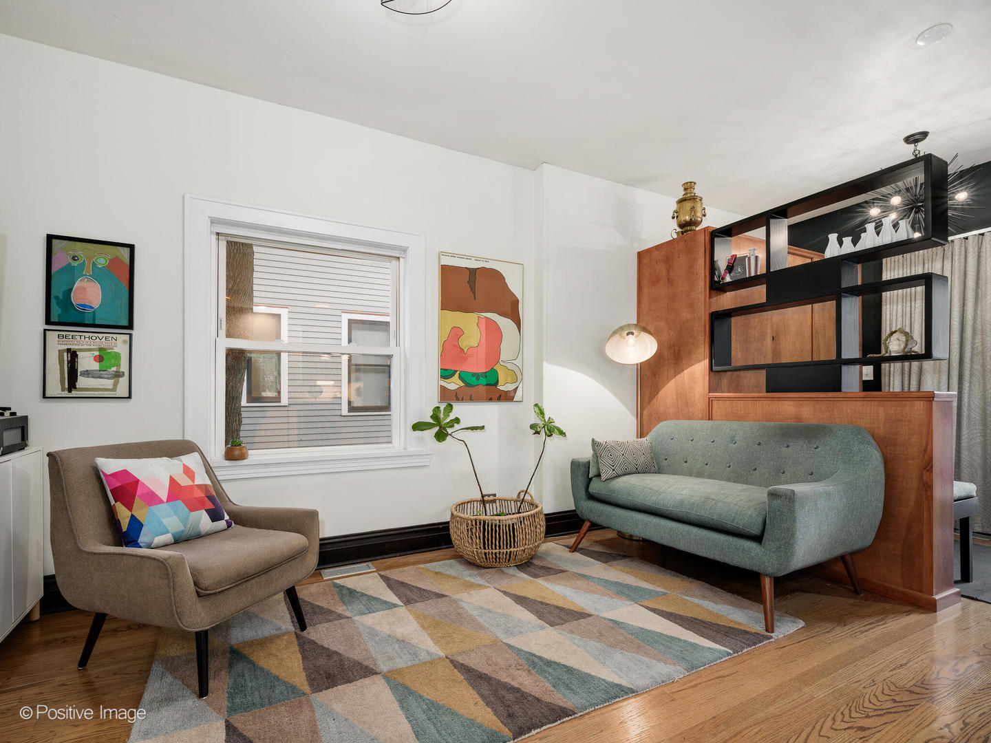 225 Clinton Avenue Oak Park, IL 60302 - Photo 13 of 37 a living room with furniture and a couch