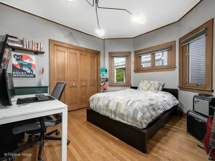 a bathroom with a sink a vanity a mirror and a bathtub