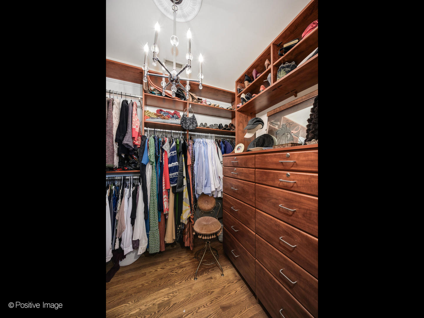 225 Clinton Avenue Oak Park, IL 60302 - Photo 22 of 37 a view of walk in closet with clothes and shoes