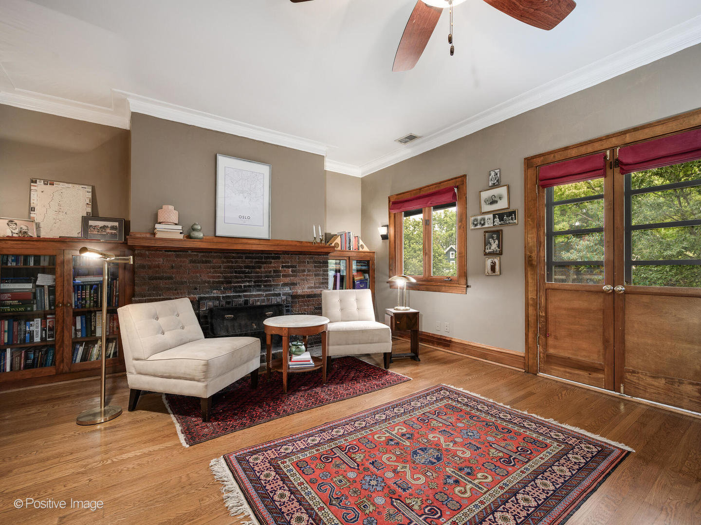 225 Clinton Avenue Oak Park, IL 60302 - Photo 25 of 37 a living room with furniture a rug and a floor to ceiling window