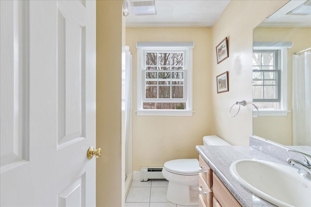 5 Lynn Street Taunton, MA 02780 - Photo 11 of 26 a bathroom with a sink and toilet