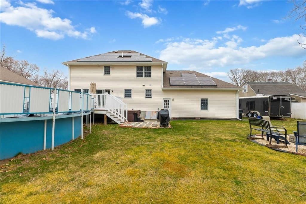 5 Lynn Street Taunton, MA 02780 - Photo 19 of 26 a view of a house with pool and chairs