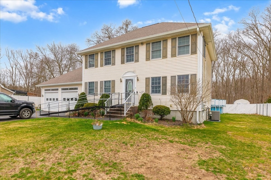 5 Lynn Street Taunton, MA 02780 - Photo 2 of 26 a view of a house with backyard porch and sitting area