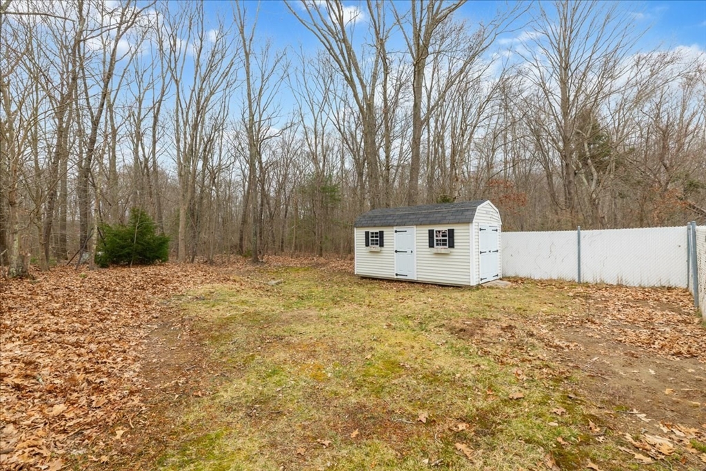 5 Lynn Street Taunton, MA 02780 - Photo 25 of 26 a house with trees in front of it