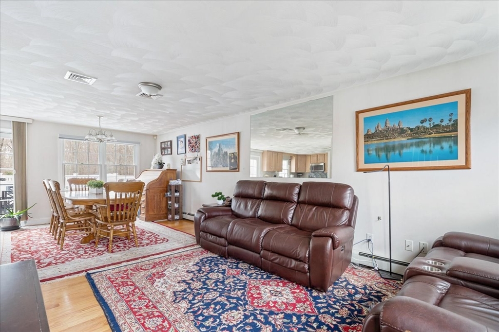 5 Lynn Street Taunton, MA 02780 - Photo 3 of 26 a living room with furniture and a couch