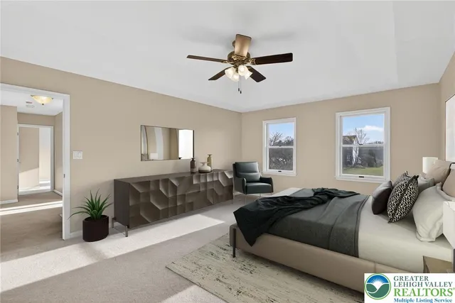 a bedroom with a bed and couch