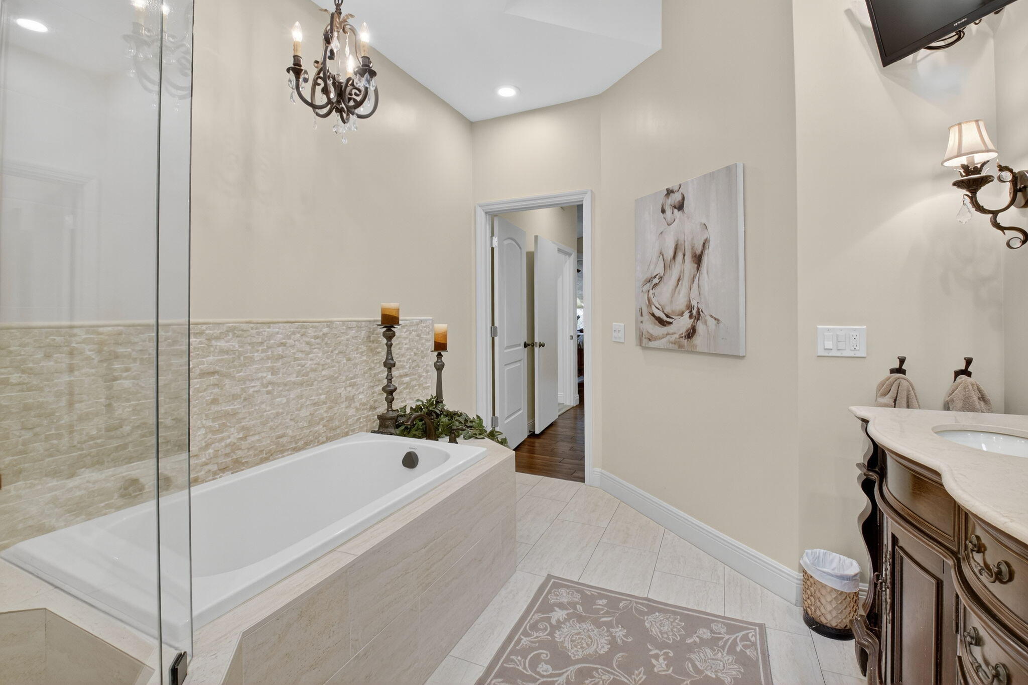 2500 Northwest 66th Drive Boca Raton, FL 33496 - Photo 24 of 45 a bathroom with a bathtub and a shower