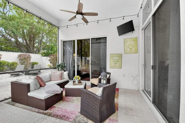 a outdoor space with patio furniture and a fireplace