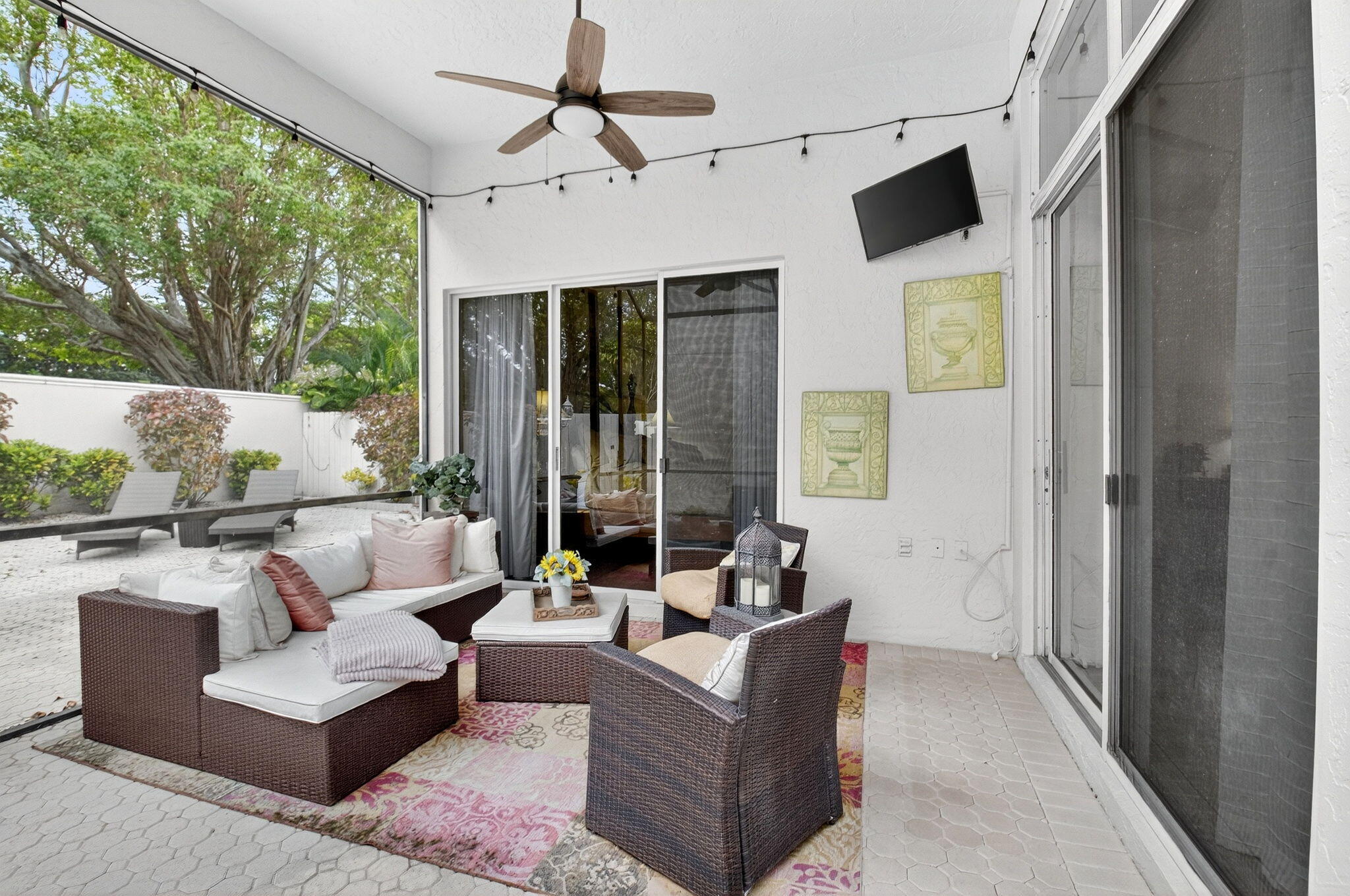 2500 Northwest 66th Drive Boca Raton, FL 33496 - Photo 33 of 45 a outdoor space with patio furniture and a fireplace