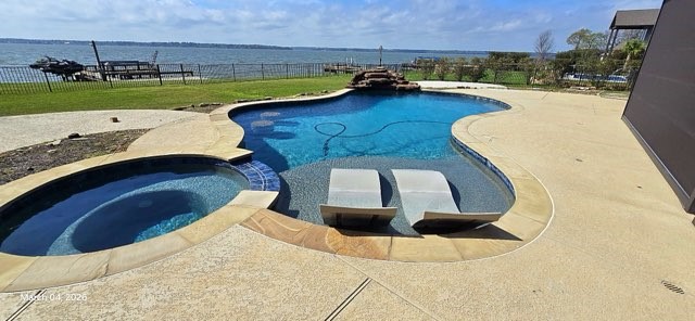 127 Bridgewater Onalaska, TX 77360 - Photo 32 of 34 a view of a swimming pool with a yard