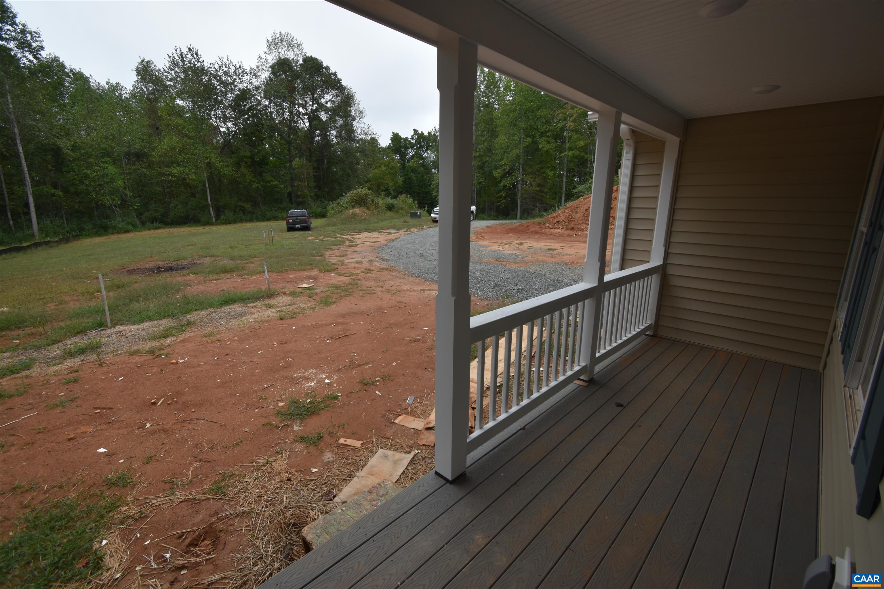280 Farm Ridge Drive Ruckersville, VA 22968 - Photo 13 of 36 a view of a porch with wooden floor and fence