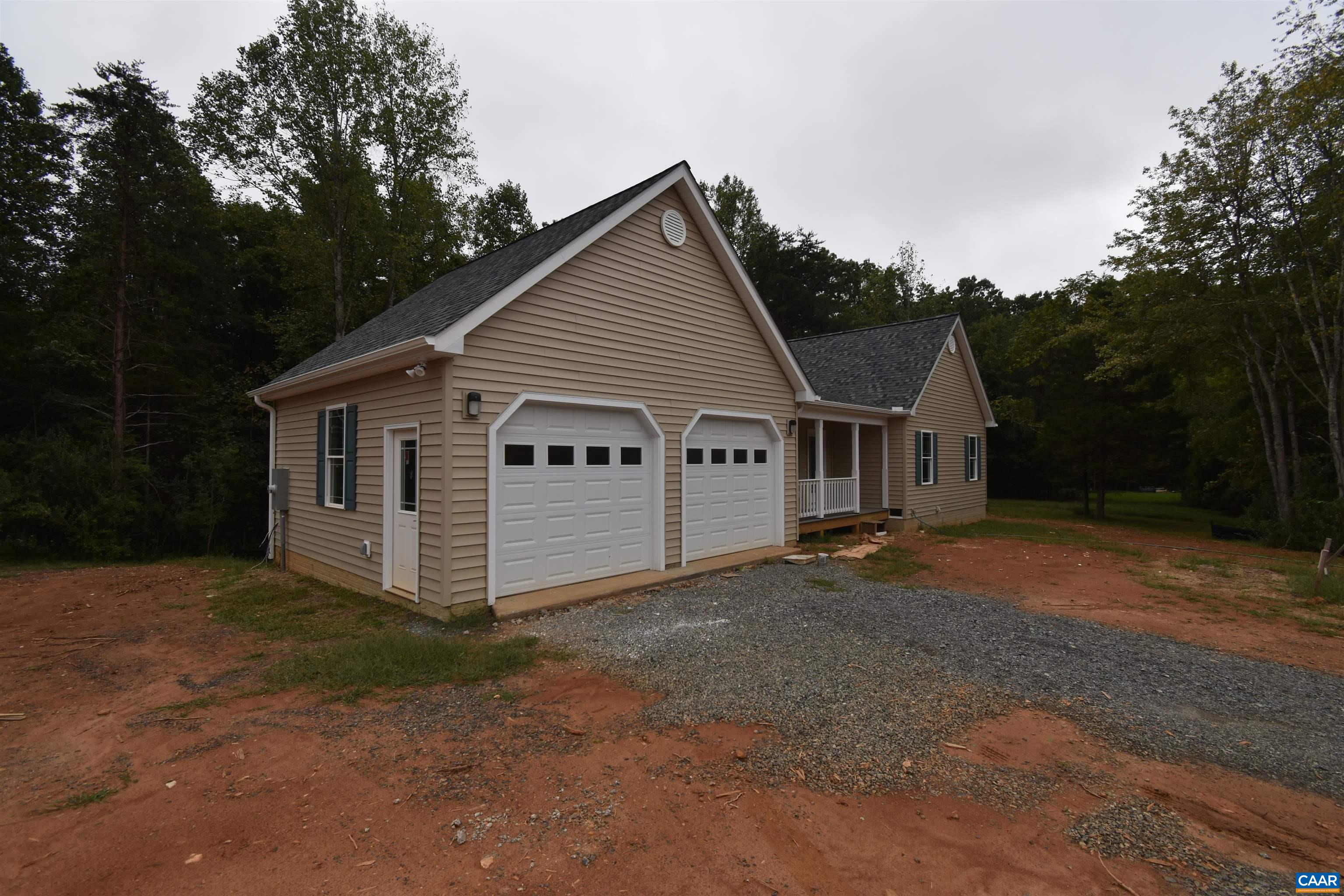 280 Farm Ridge Drive Ruckersville, VA 22968 - Photo 5 of 36 a view of a house with a yard and large tree