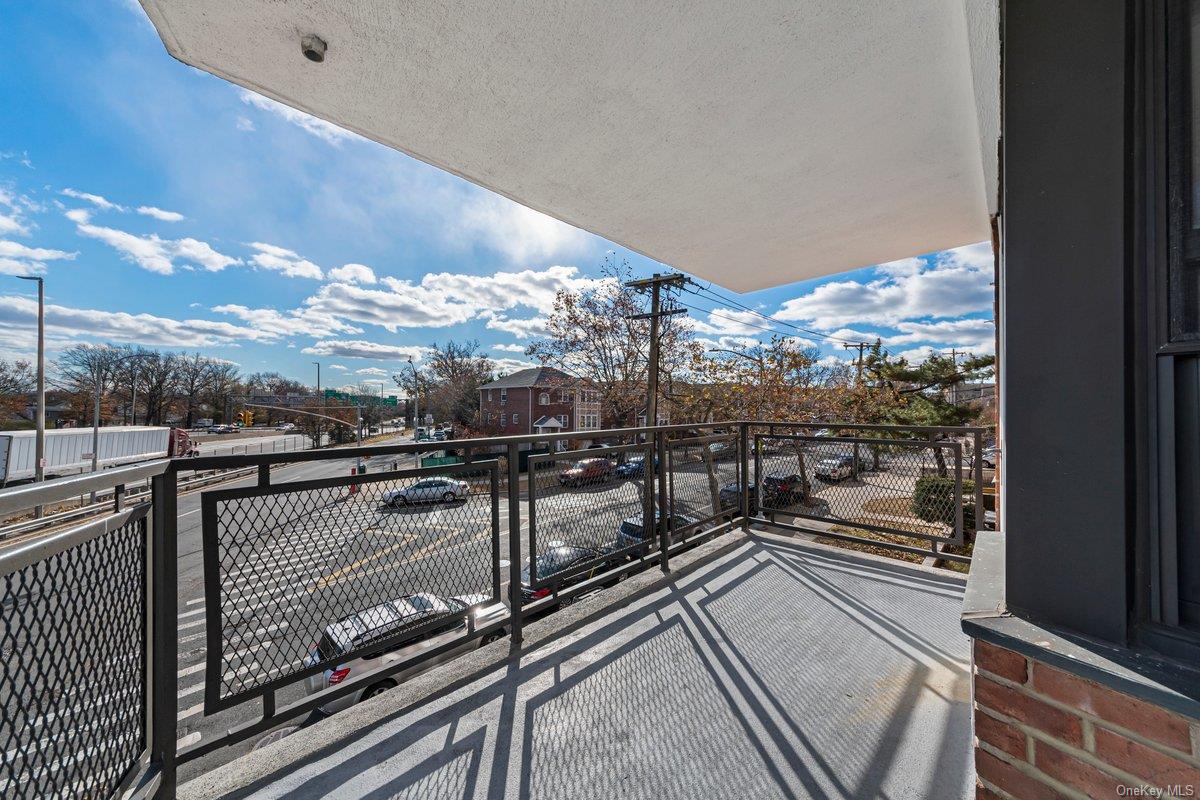3121 Middletown Road, Unit 2K Bronx, NY 10461 - Photo 5 of 18 a view of a balcony with wooden floor