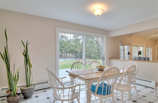 23 Blueberry Hill Road Andover, MA 01810 - Photo 12 of 30 a view of a dining room with furniture window and outside view