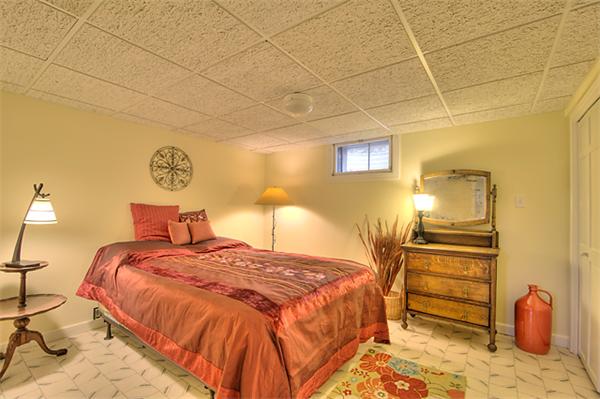 23 Blueberry Hill Road Andover, MA 01810 - Photo 27 of 30 a bedroom with a bed and a walk in closet