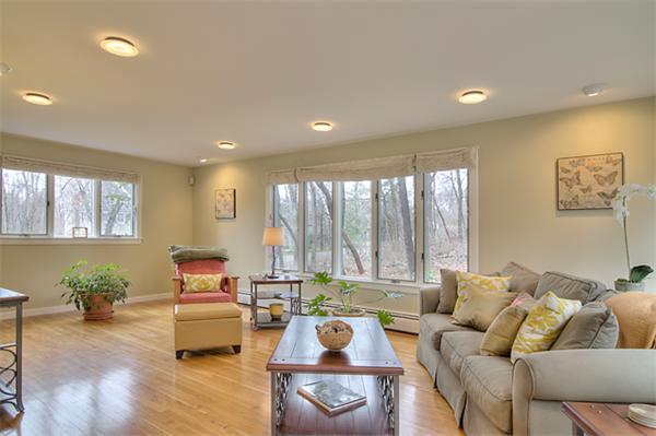 23 Blueberry Hill Road Andover, MA 01810 - Photo 7 of 30 a living room with furniture and a large window