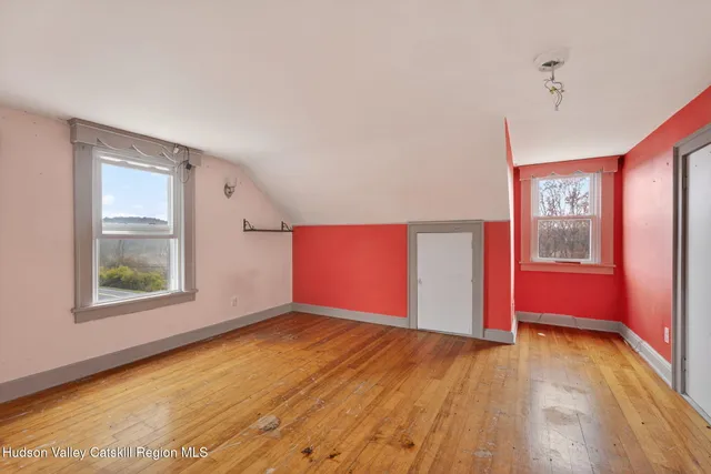 an empty room with windows