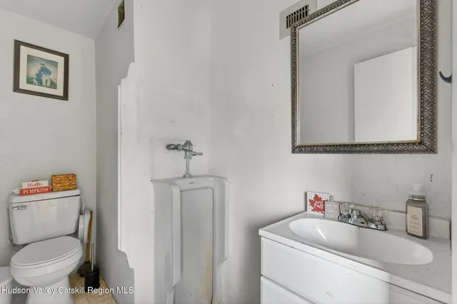 a view of a lake in middle of forest