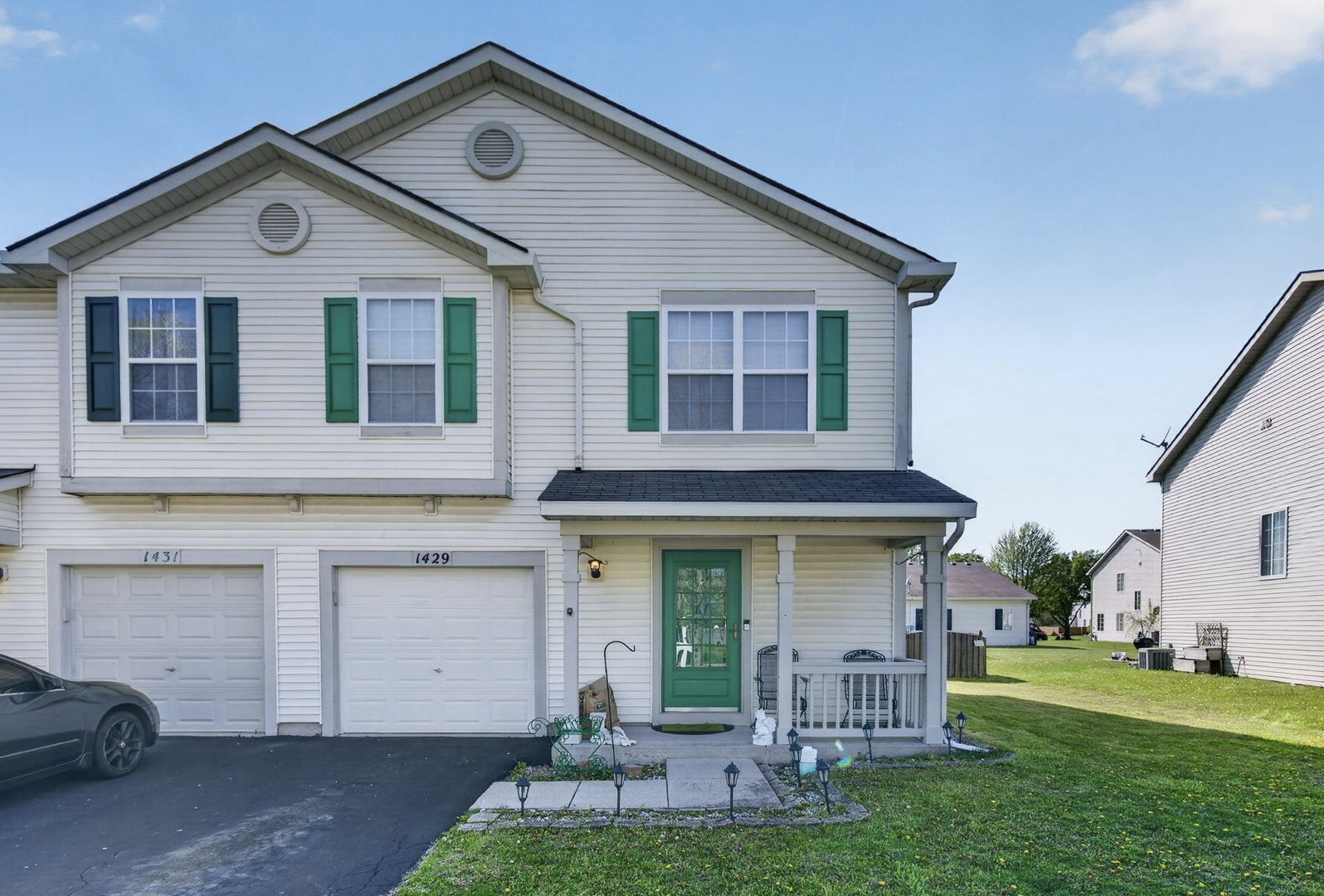 1429 Levato Lane Minooka, IL 60447 - Photo 1 of 27 a front view of a house with a yard