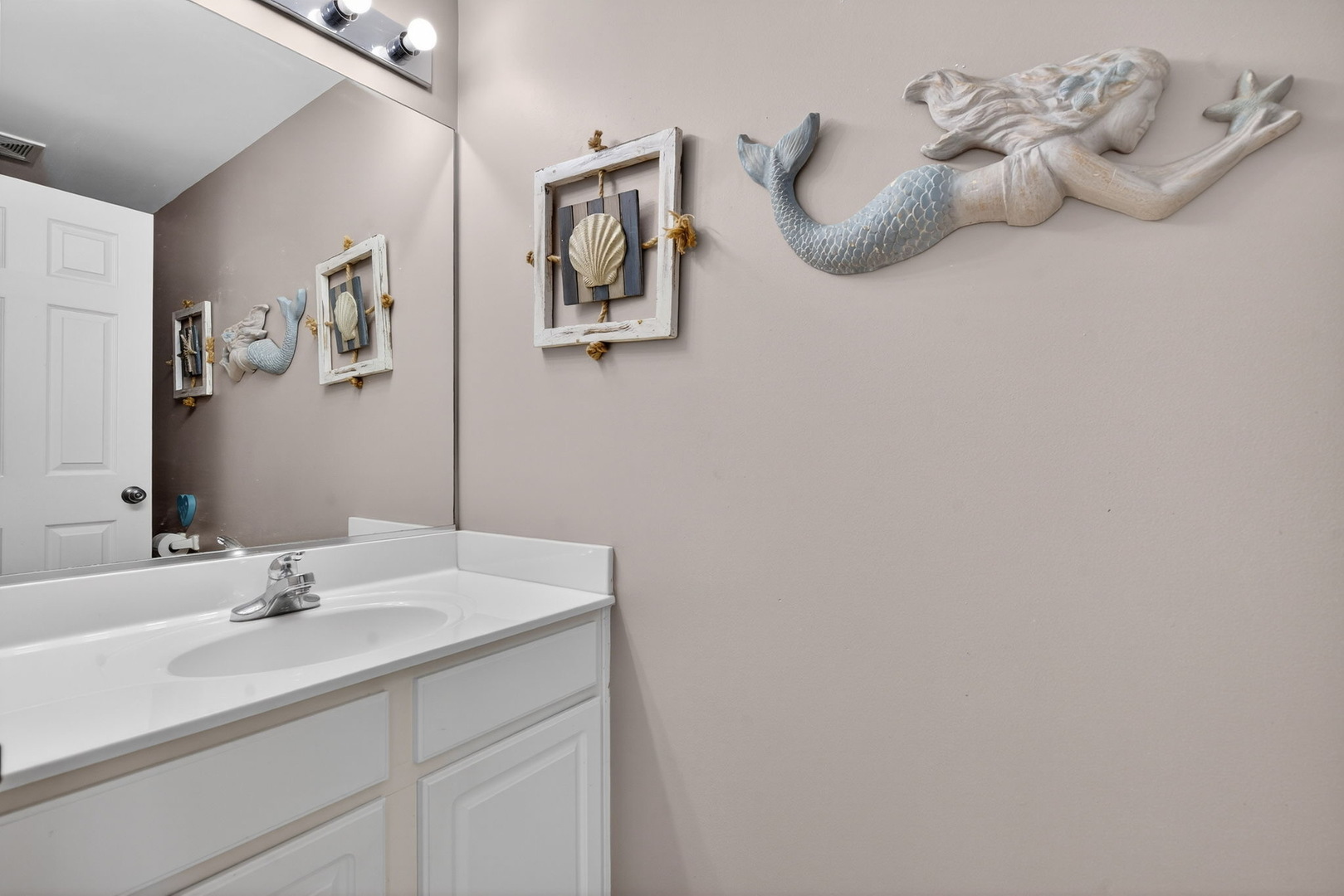 1429 Levato Lane Minooka, IL 60447 - Photo 13 of 27 a bathroom with a sink and a mirror