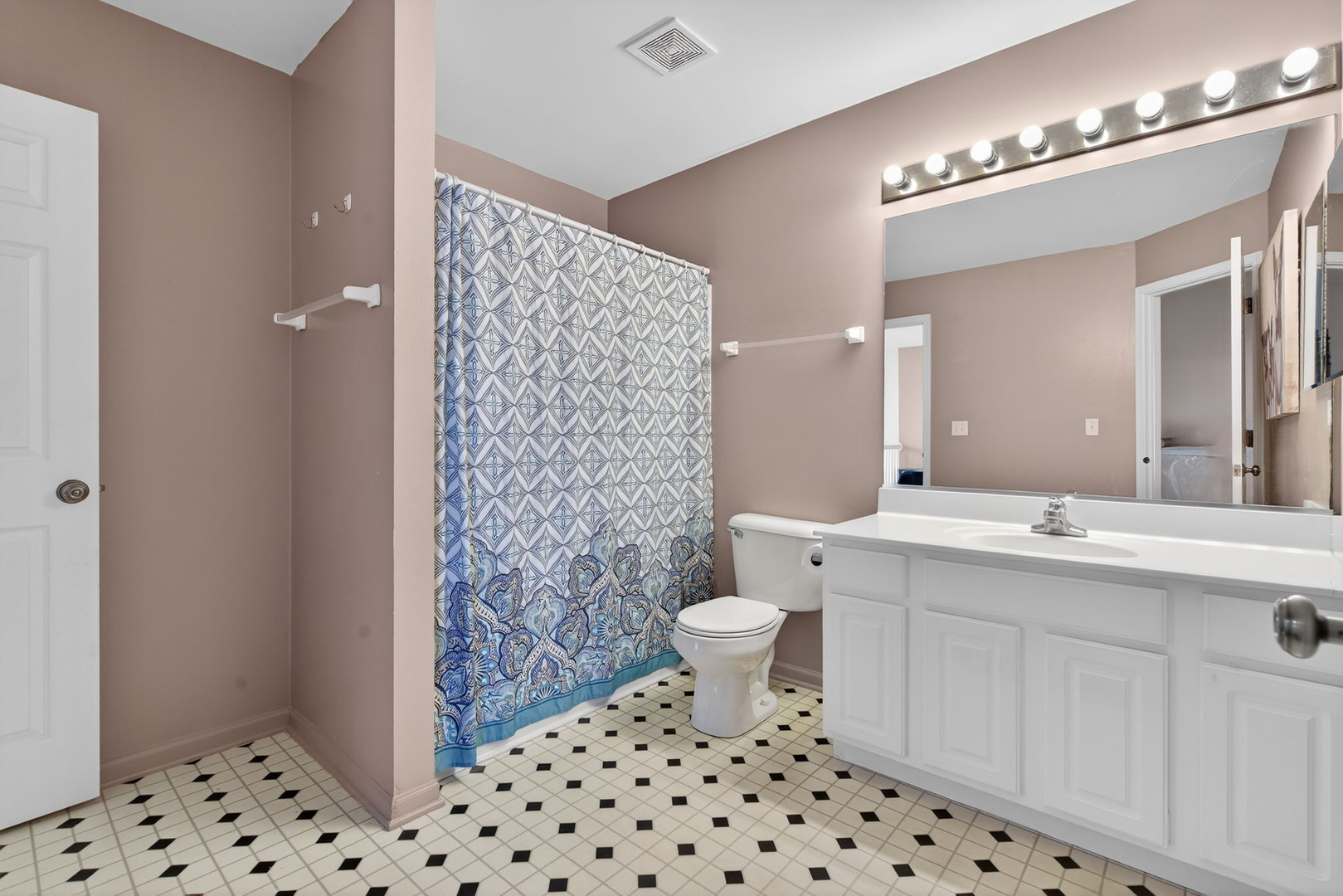 1429 Levato Lane Minooka, IL 60447 - Photo 17 of 27 a bathroom with a sink a toilet a shower and a mirror
