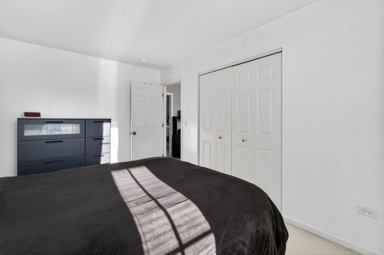 1429 Levato Lane Minooka, IL 60447 - Photo 19 of 27 a bedroom with a bed and a refrigerator
