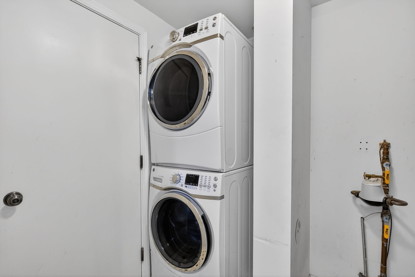 1429 Levato Lane Minooka, IL 60447 - Photo 22 of 27 a view of a storage & utility room with dryer and washer