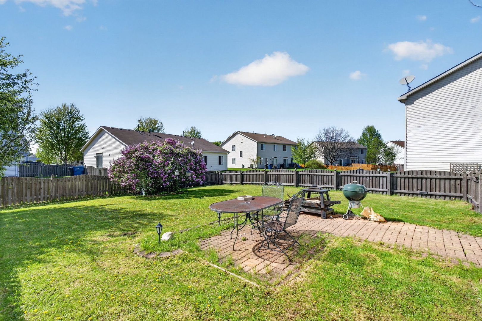 1429 Levato Lane Minooka, IL 60447 - Photo 26 of 27 a view of a house with backyard and sitting area