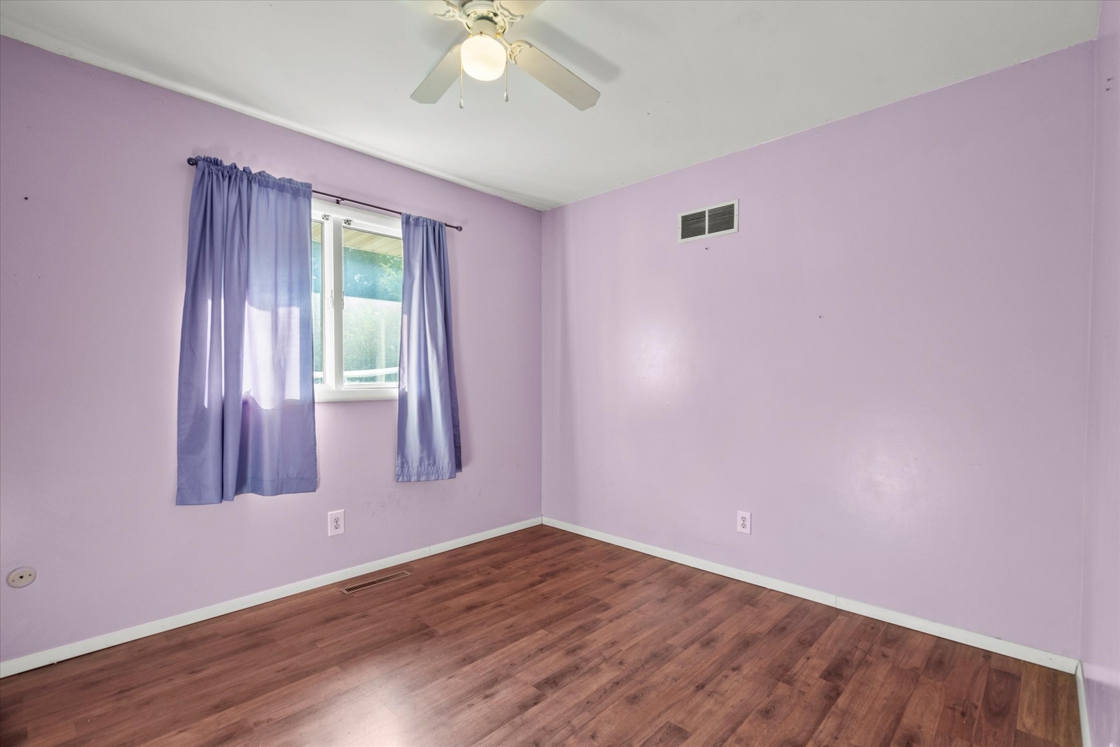 464 East Pilot Drive Herscher, IL 60941 - Photo 20 of 23 a view of an empty room with wooden floor and a window