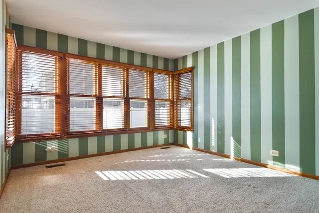 a view of a room with a large window