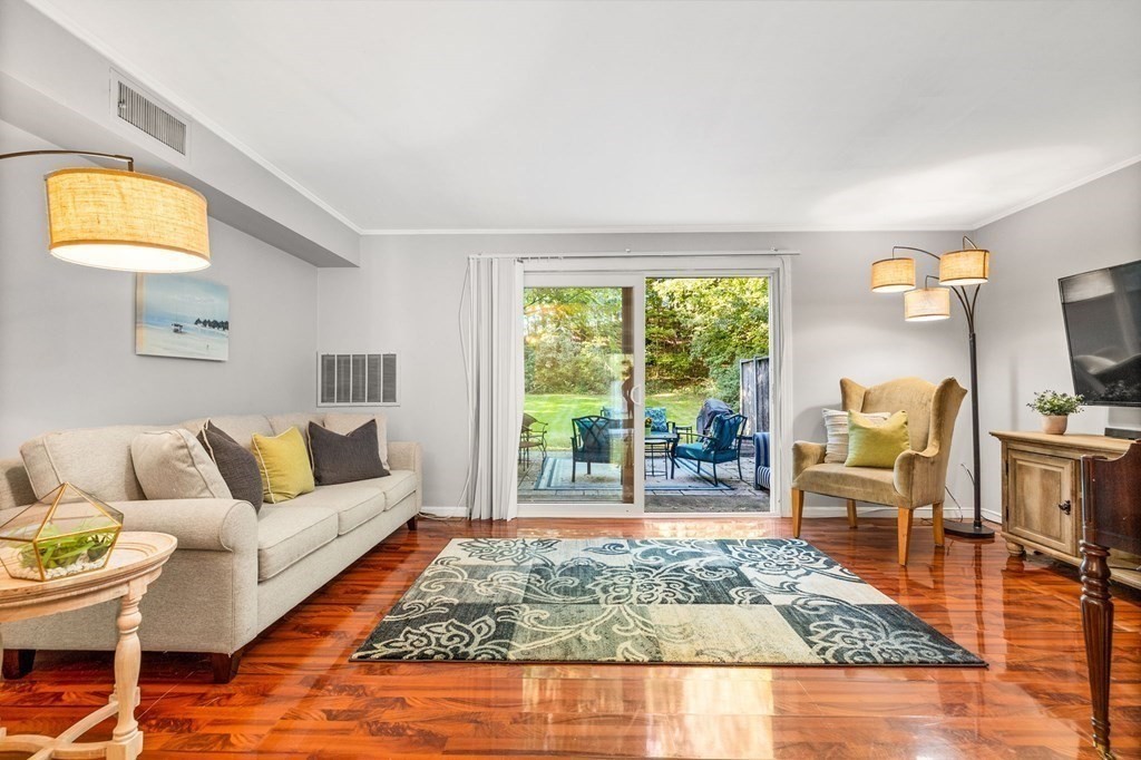 5 Beal's Cove Road, Unit B Hingham, MA 02043 - Photo 12 of 27 a living room with furniture and a rug