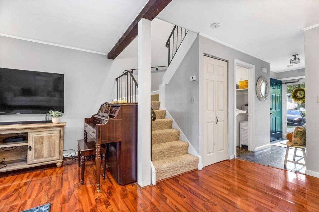 5 Beal's Cove Road, Unit B Hingham, MA 02043 - Photo 15 of 27 a view of a livingroom with wooden floor and furniture