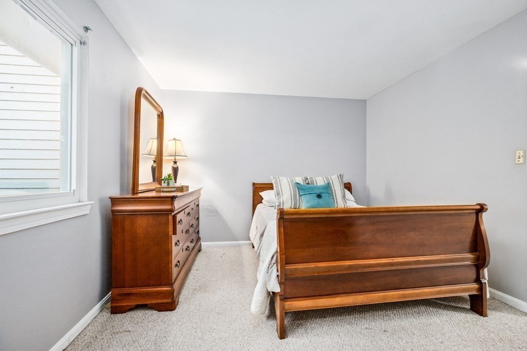 5 Beal's Cove Road, Unit B Hingham, MA 02043 - Photo 17 of 27 a view of livingroom with furniture and a window